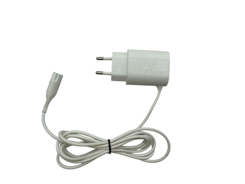 Braun AC/DC adapter. Modell 492-5214 /12.0V400mA, 7W(beg)