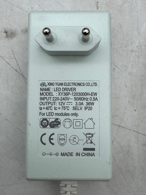 Xing Yuan Laddare/AC-adapter Modell: XY36P-1203000H-EW /12V 3.0A 36W
