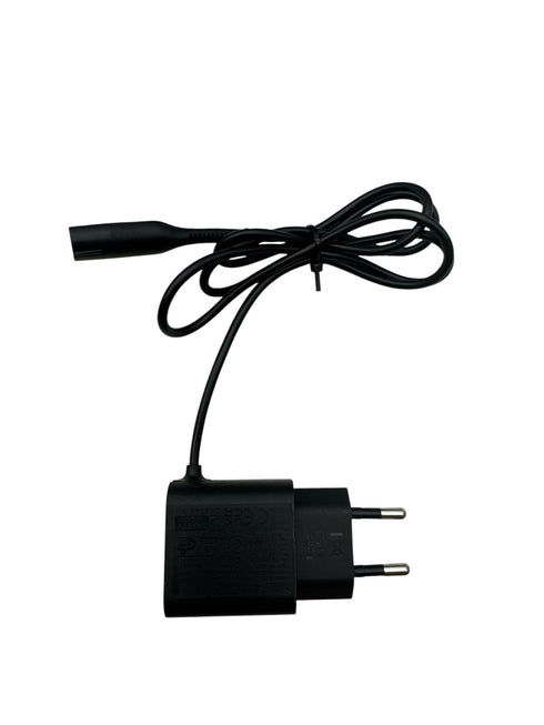 Braun AC/DC adapter. (modell 492-5218) 12V / 7W (beg)