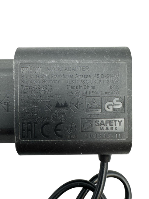 Braun AC/DC adapter. Modell 492-5218 12.0V 0.4A, 4.8W(beg)